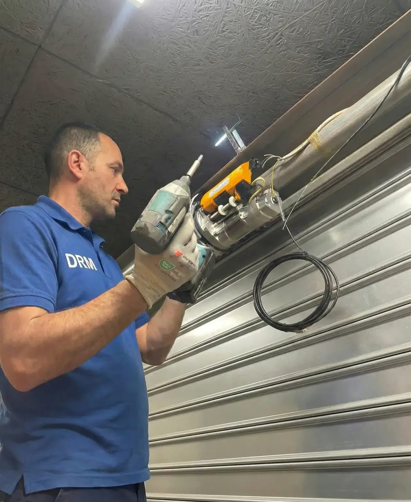 Motorisation de rideau métallique à Courbevoie